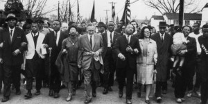 30th March 1965: American civil rights campaigner Martin Luther King (1929 - 1968) and his wife Coretta Scott King lead a black voting rights march from Selma, Alabama, to the state capital in Montgomery. (Photo by William Lovelace/Express/Getty Images)